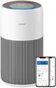 Philips Series 2200 luchtreiniger met blauwe LED-ring en Philips Air+ app op smartphone